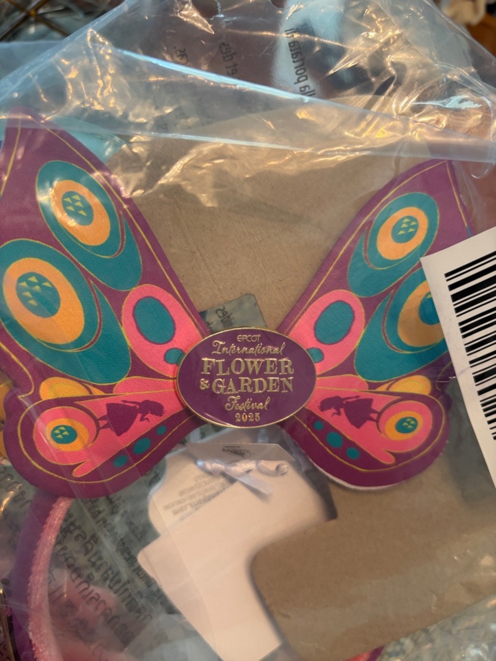Disney Alice In Wonderland Epcot Purple Butterfly Headband with Floral Accents - Picture 10 of 10